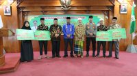 PJ Walikota Imran Serahkan Bonus Kepada Peraih Juara MQK dan MTQ