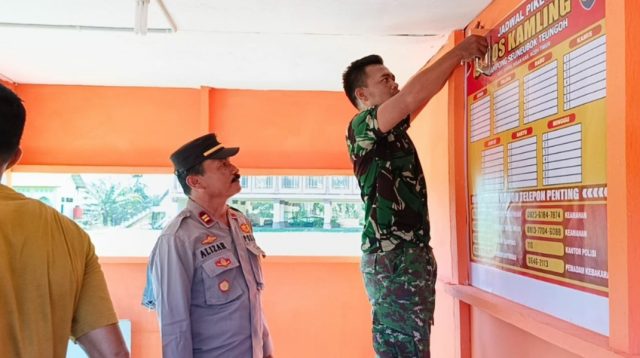 TNI-Polri Bersinergi Bangun Pos Kamling di Darul Ihsan