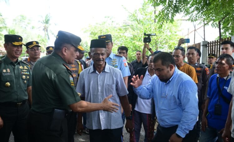 Pj Bupati Aceh Besar Hadiri Upacara Karya Bakti TNI