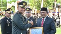Sekda Kota Sabang Hadiri Upacara HUT Bhayangkara dan Terima Penghargaan
