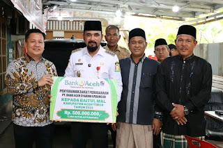 Bupati Aceh Timur Terima Zakat Perusahaan Dan CSR Dari Bank Aceh